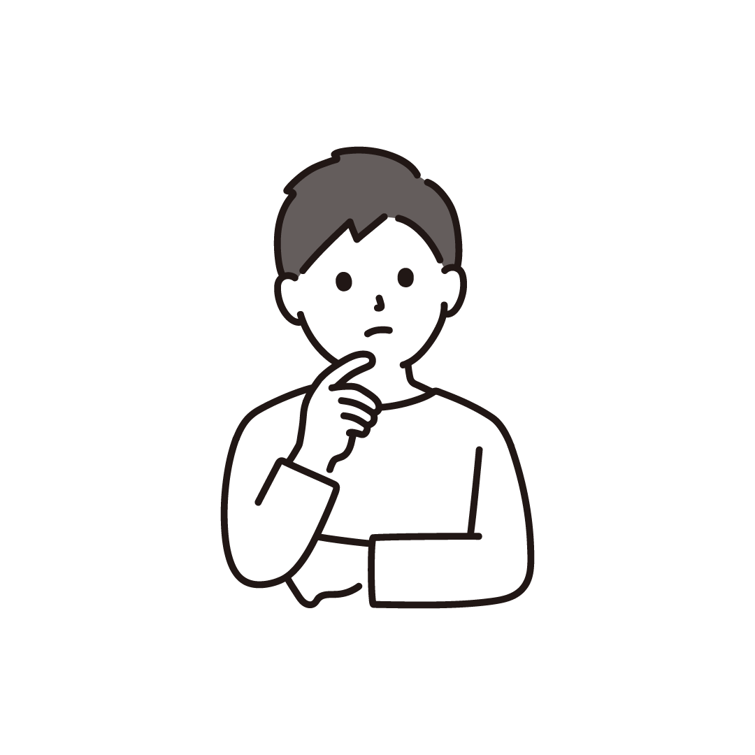 考え事をする男性
