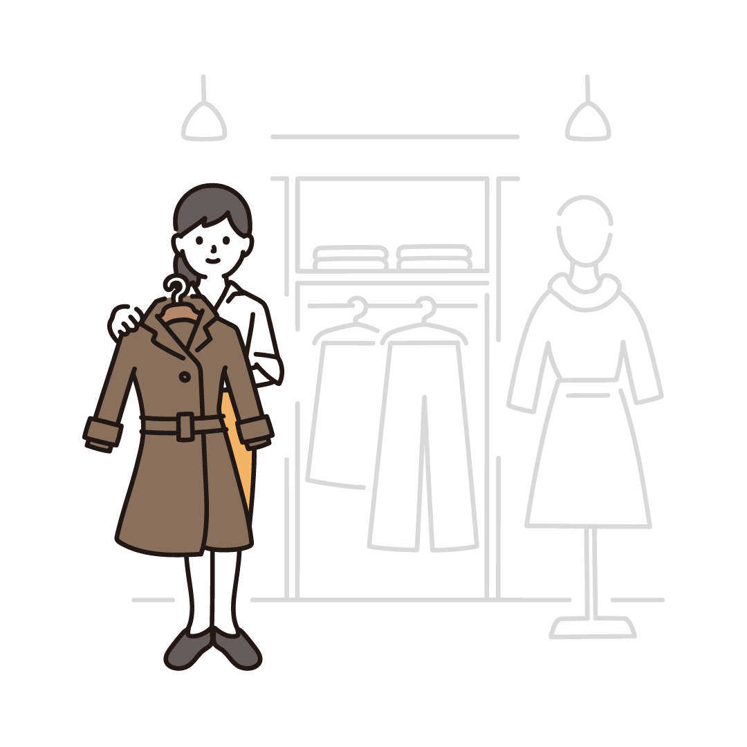 アパレル店舗で接客する女性