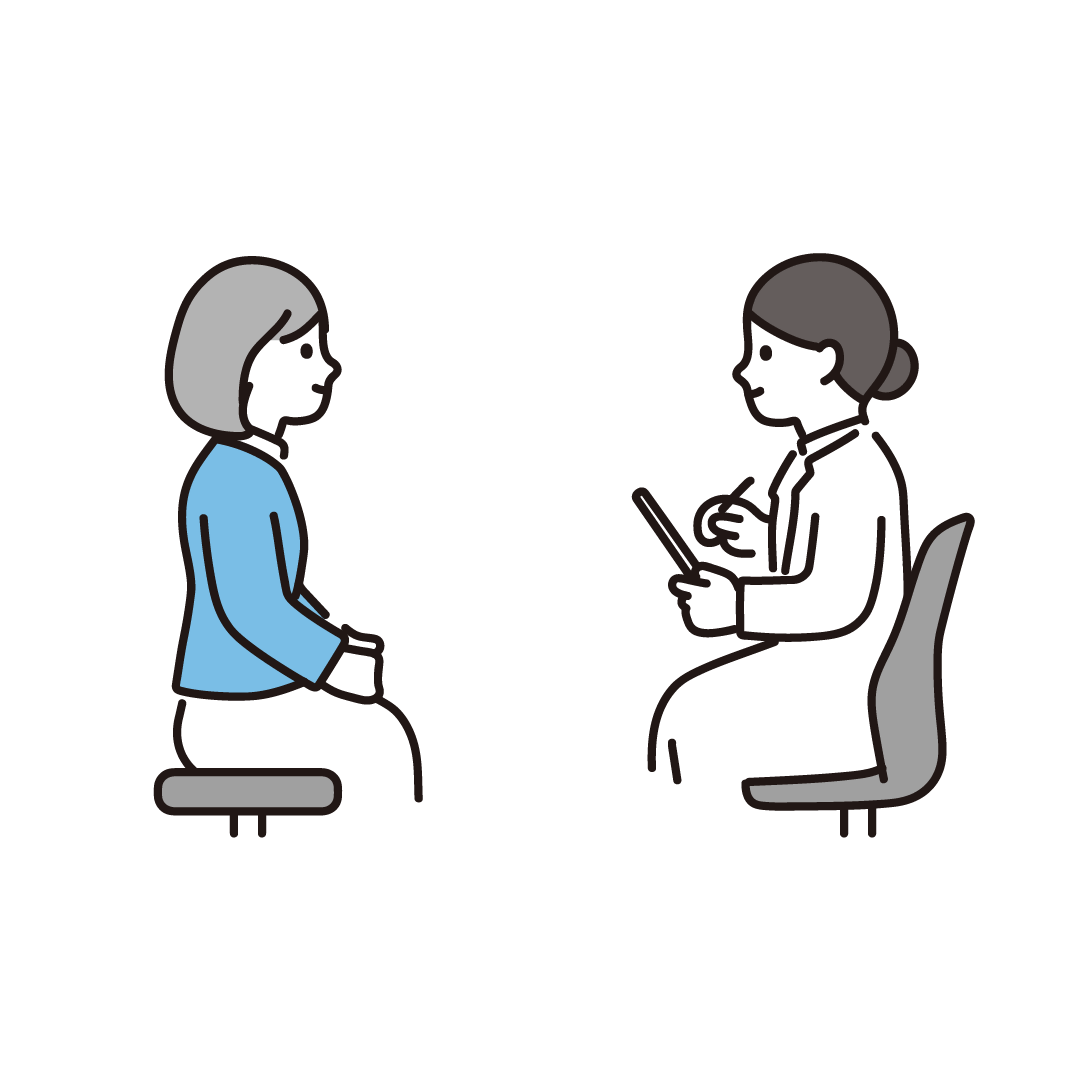 診察をうける中年女性
