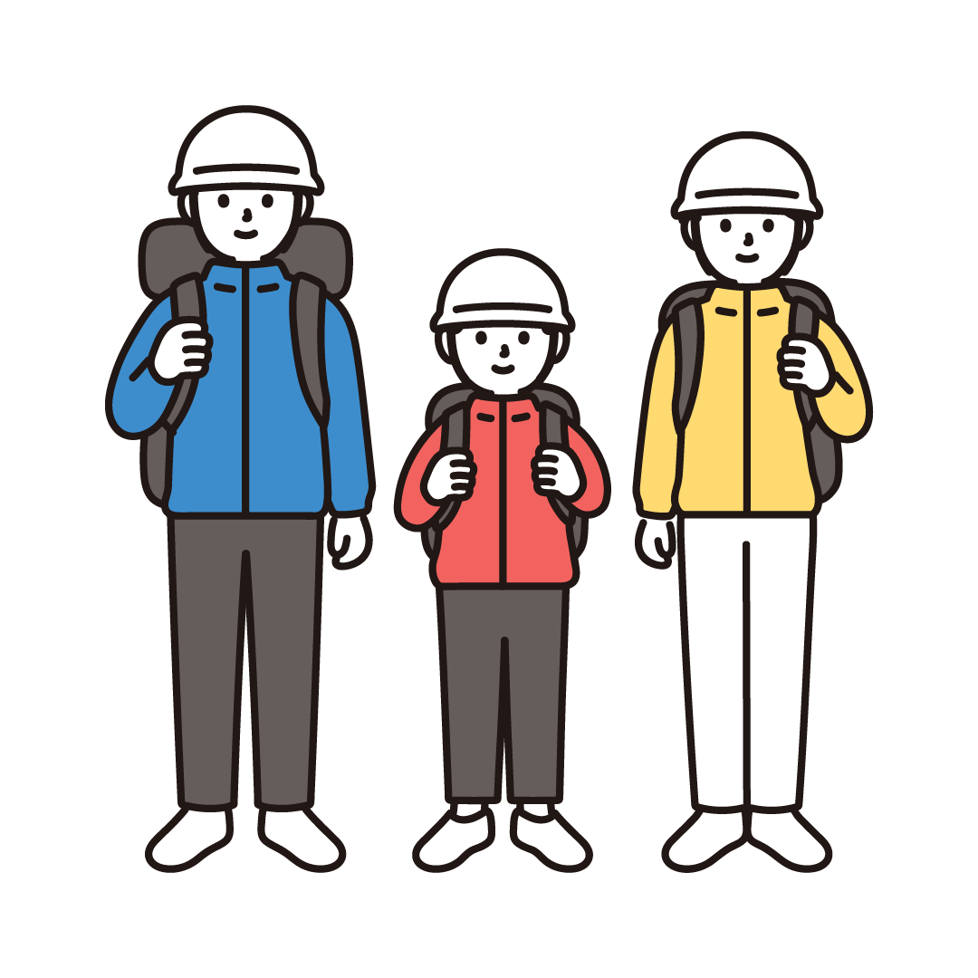 防災リュックを背負った家族