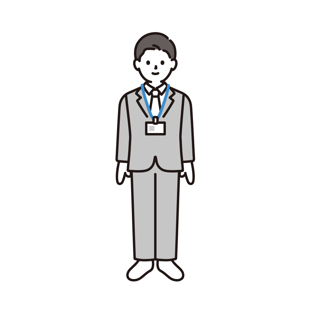 入館証をぶら下げた会社員