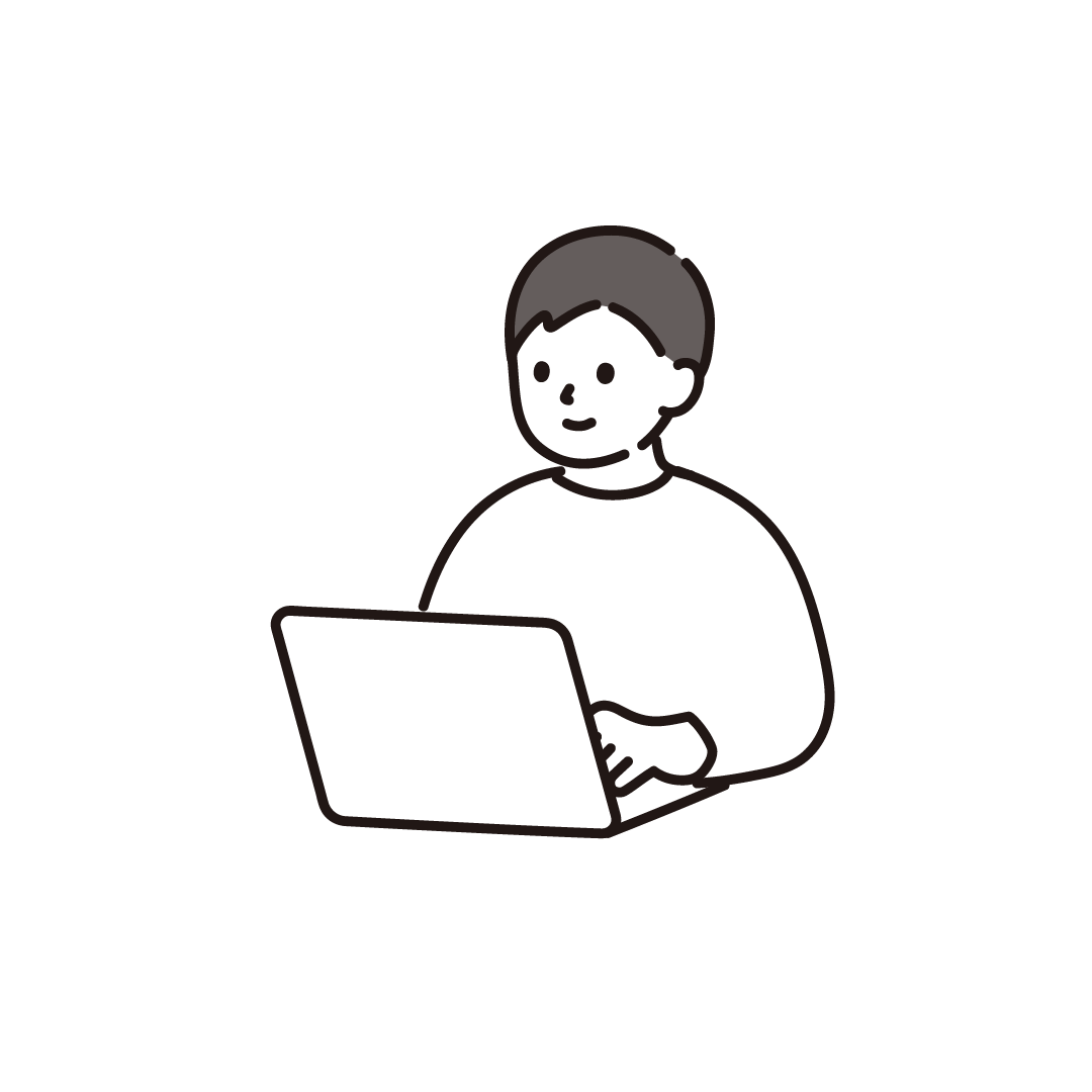 パソコンを使う男性（斜め）