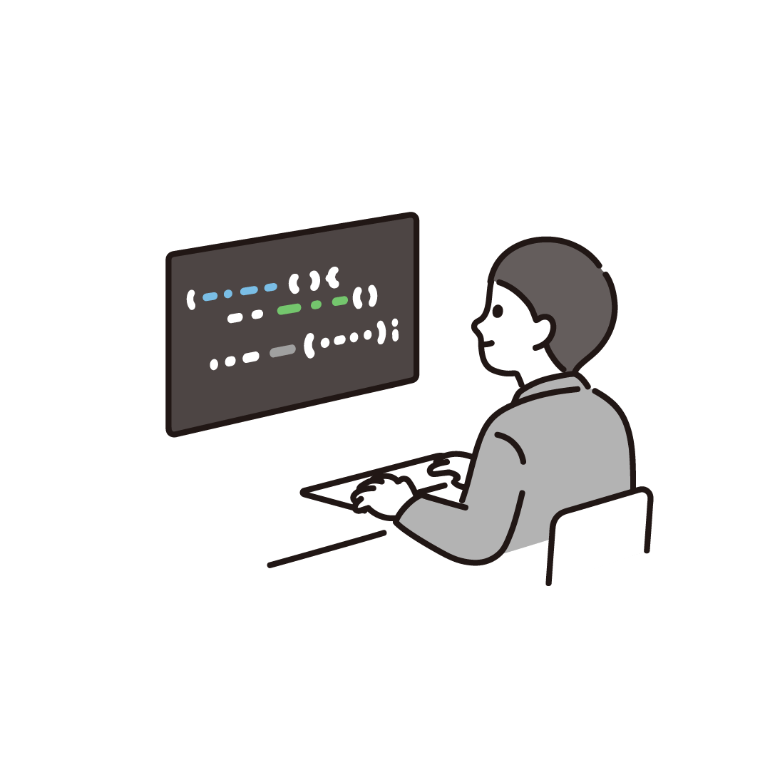 プログラミングをする男性（スーツ）