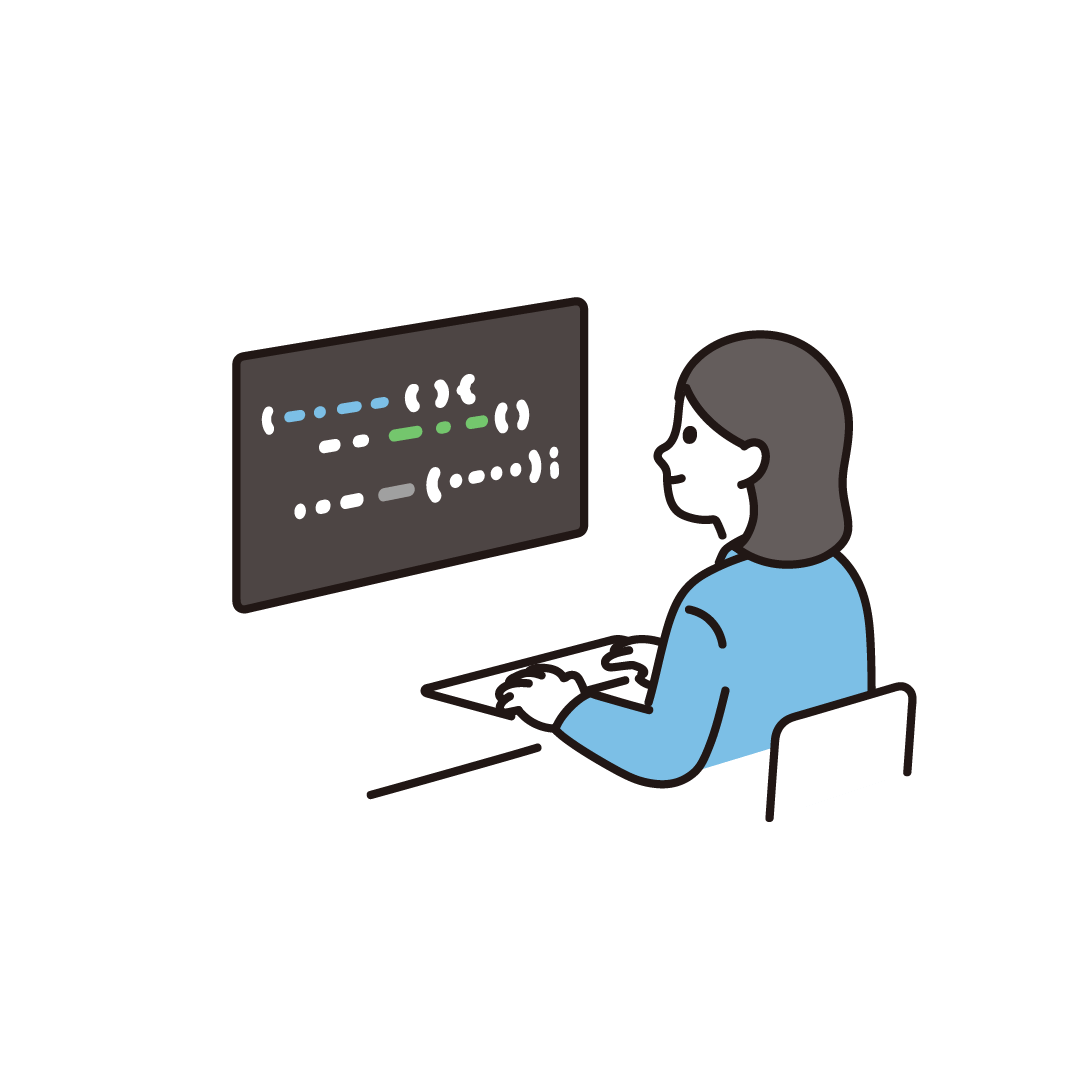 プログラミングをする女性（スーツ）