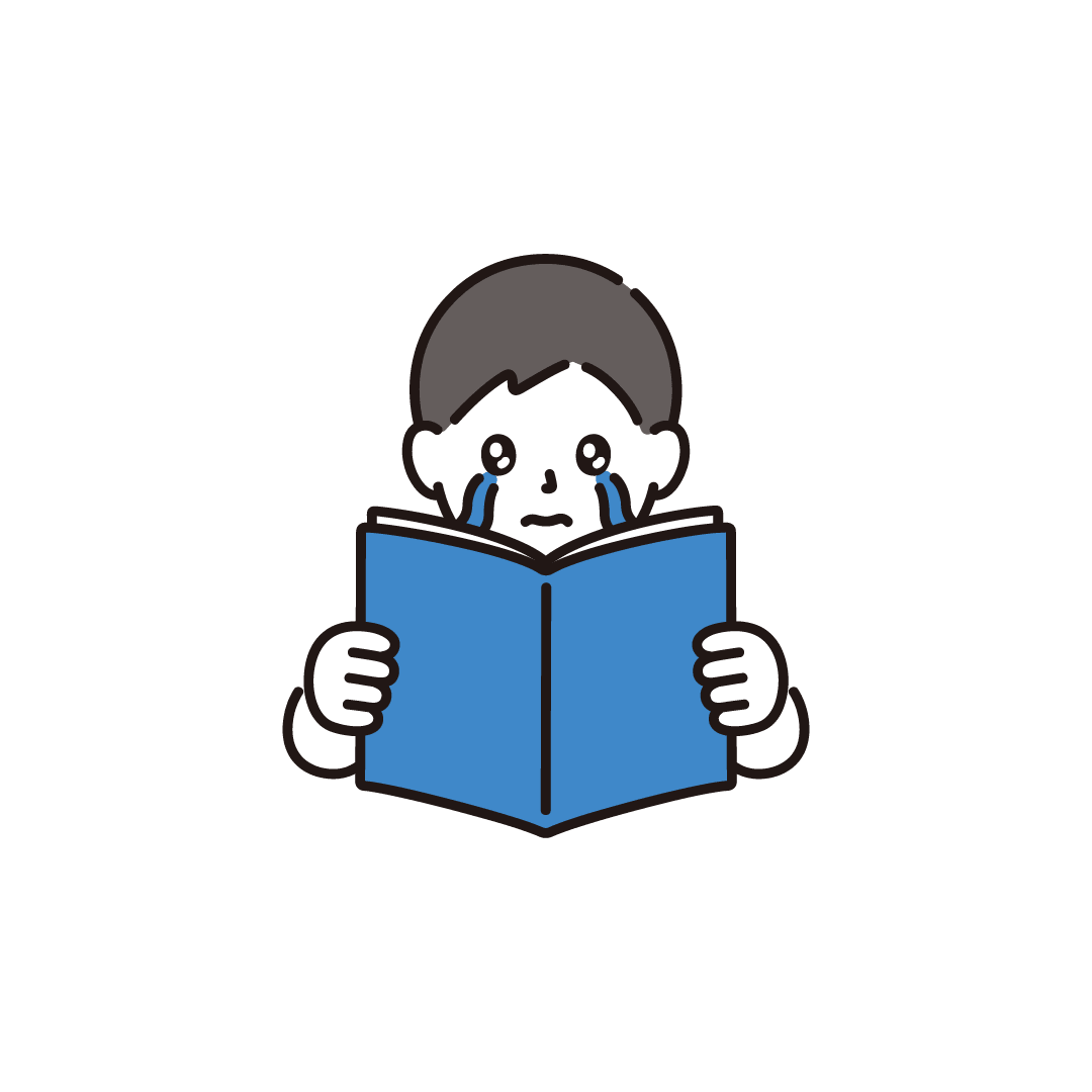 泣きながら本を読む男性