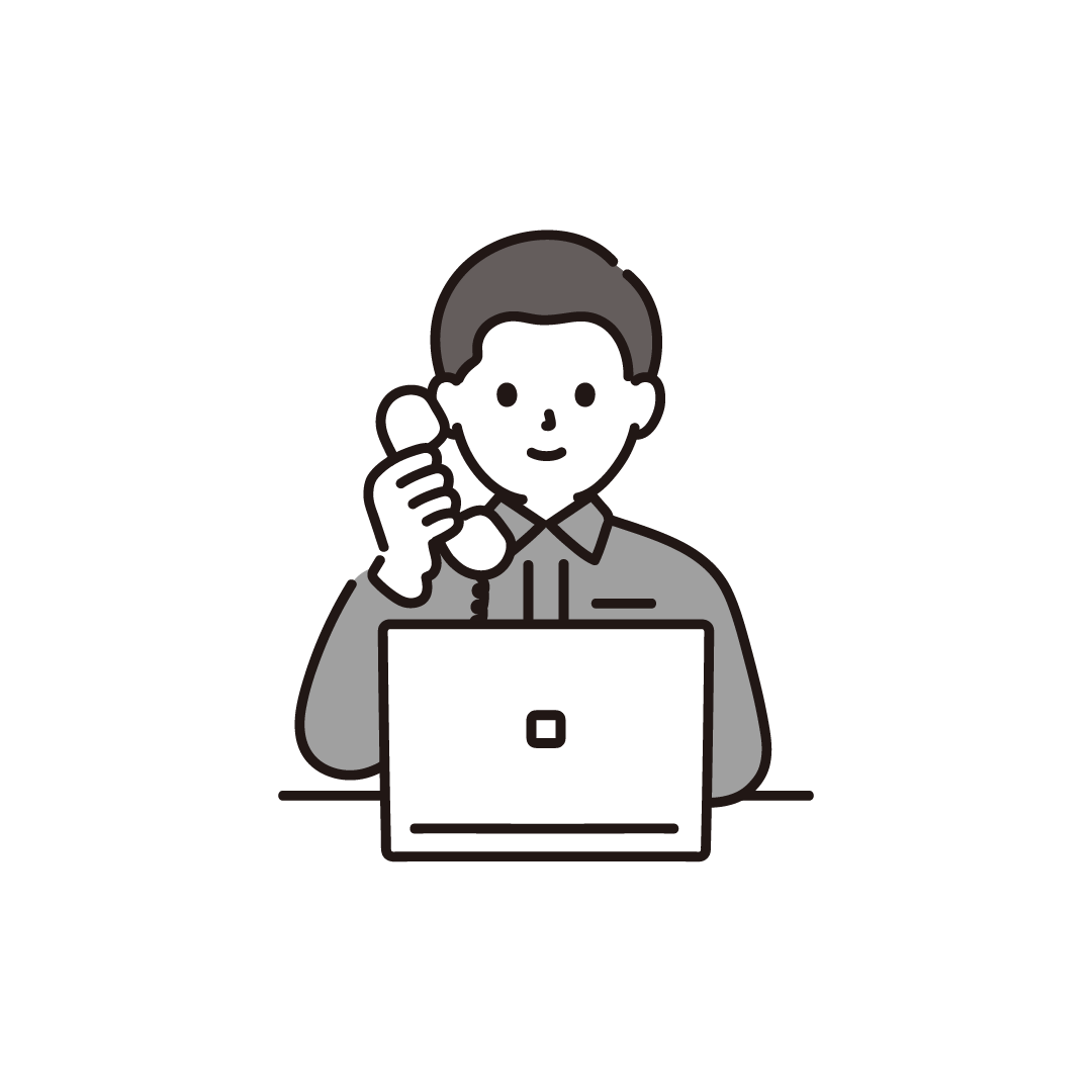 電話をする作業着男性